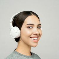 Portrait of Olga Zarichna, a calm and friendly looking woman in her 30s.